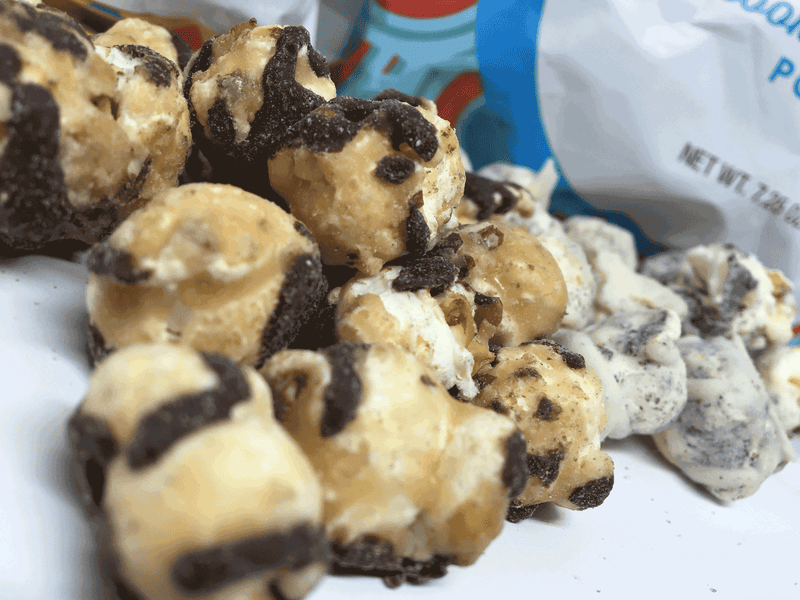 Illustration for article titled Pop Works' Salted Caramel & Fudge And Cookies & Cream Popcorn: The Snacktaku Review